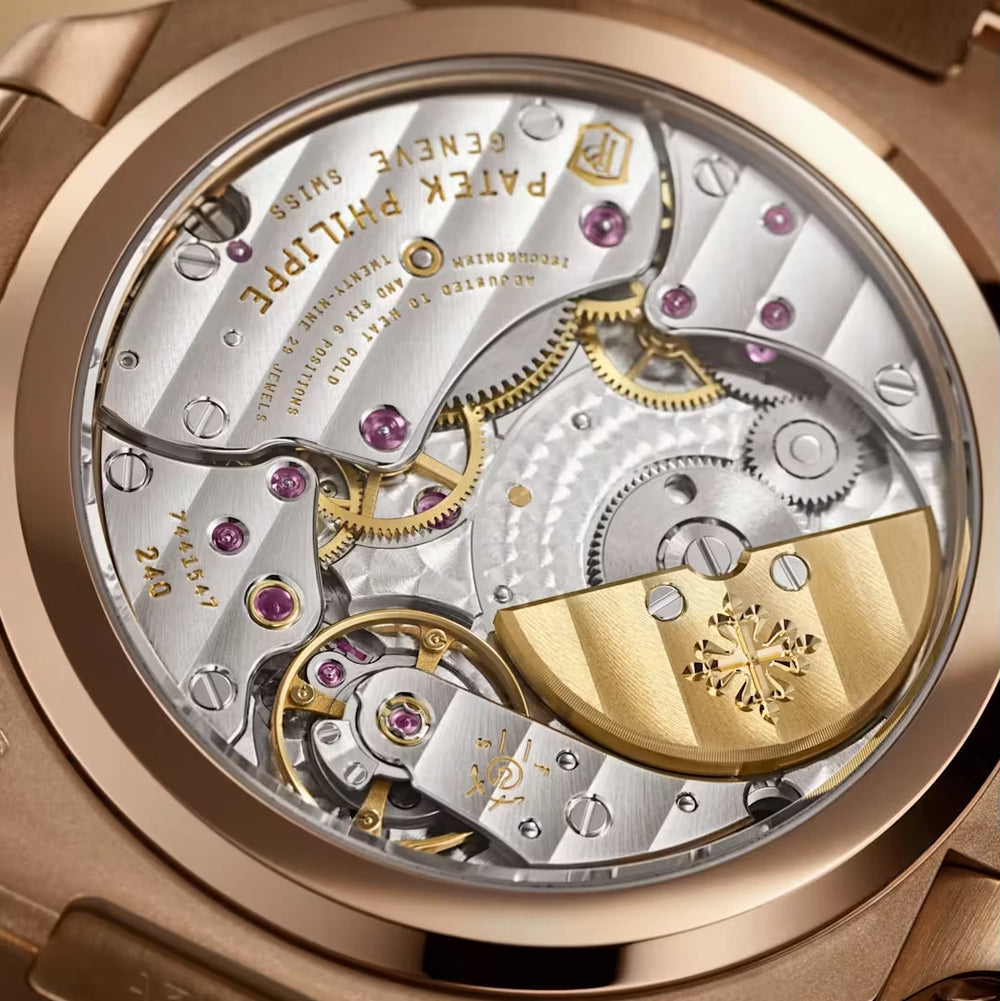 Patek Philippe Nautilus
Moon Phase Rose Gold 40mm Brown Black Dial 5712/1R