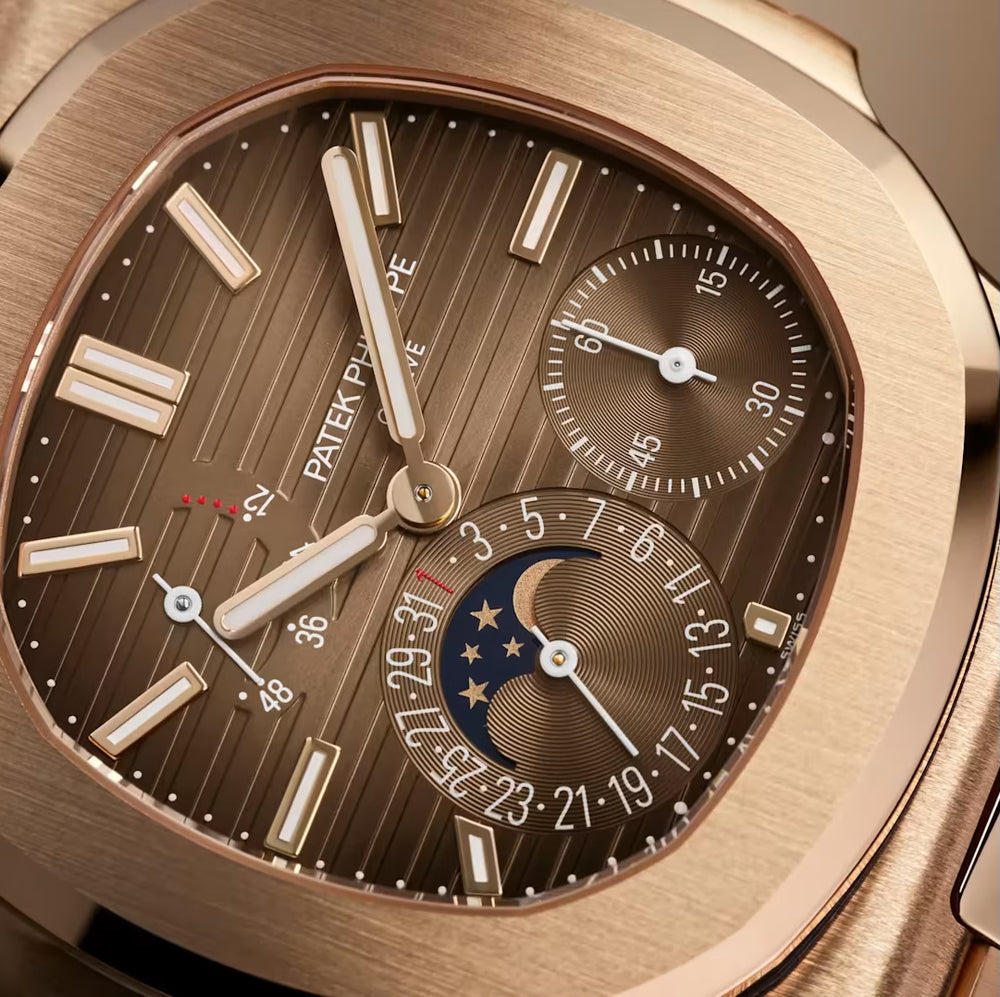Patek Philippe Nautilus
Moon Phase Rose Gold 40mm Brown Black Dial 5712/1R