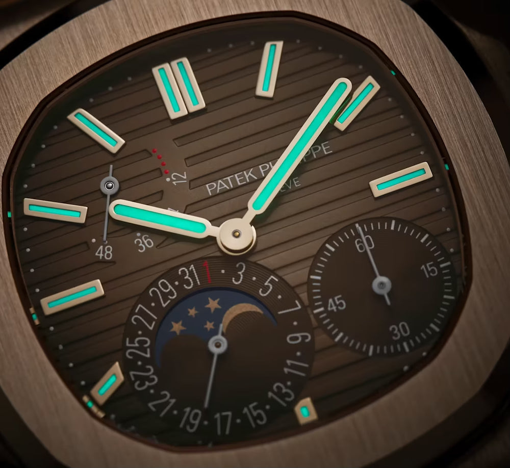 Patek Philippe Nautilus
Moon Phase Rose Gold 40mm Brown Black Dial 5712/1R
