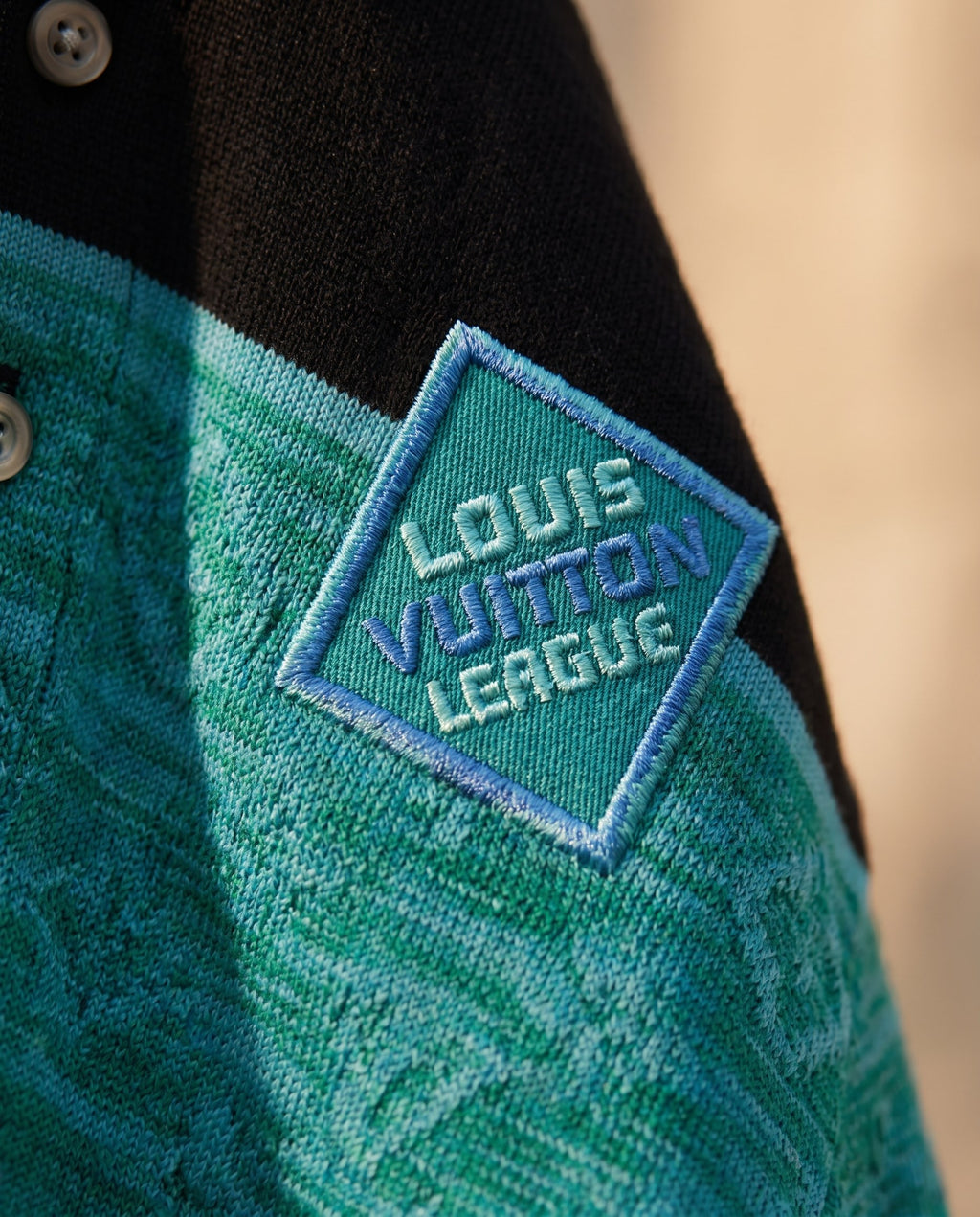 Louis Vuitton Black/Mint Green Polo (detail)